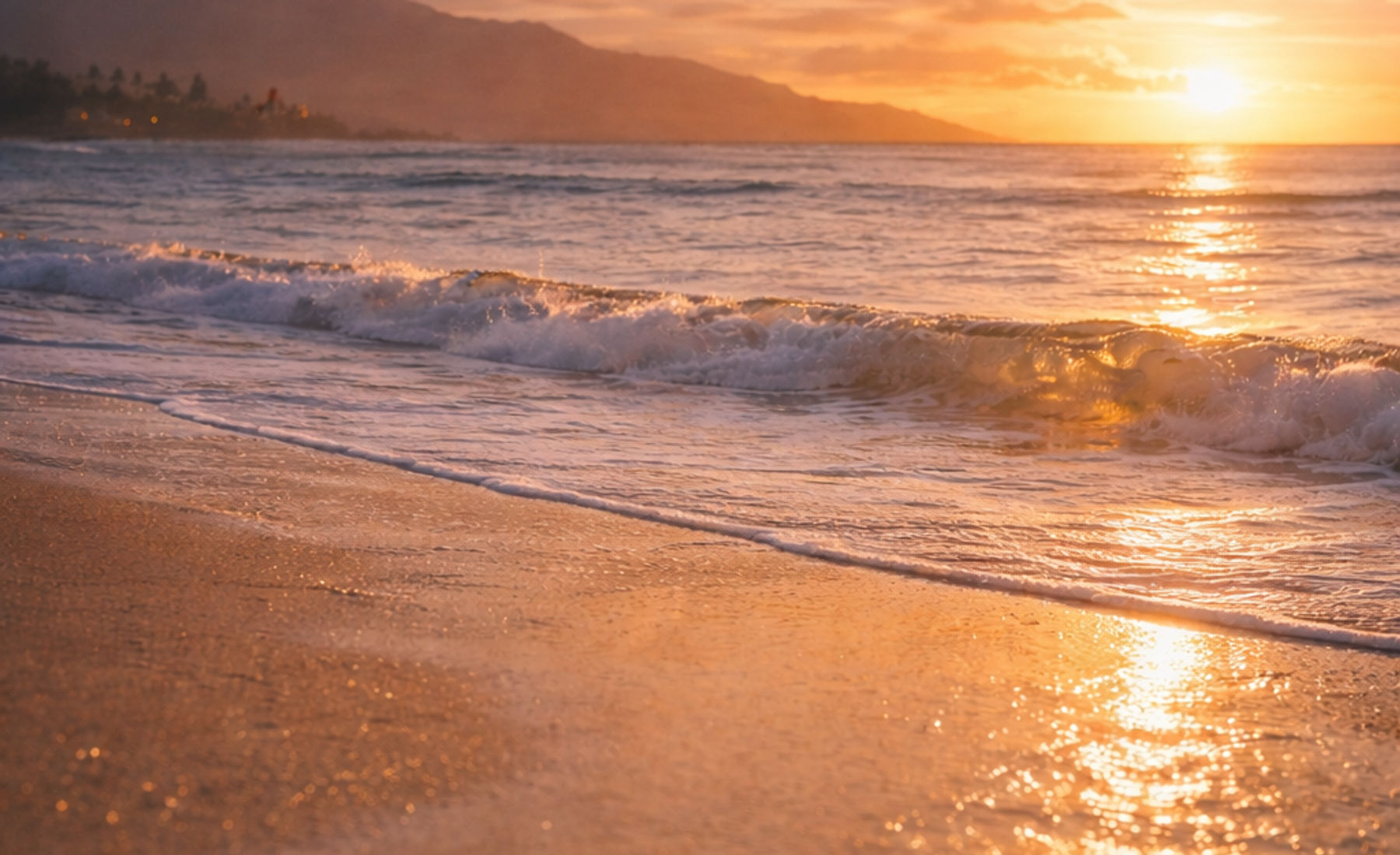 Waves at sunset on a Hawaiʻi shoreline
